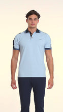 Load and play video in Gallery viewer, Polo Porto Blanco color azul y franjas | PLE-2440
